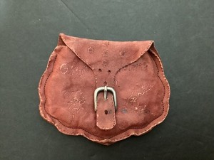 Small antique leather coinpurse marked 1909