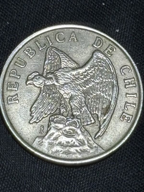 1975 50 Centavos From The Republic Of Chile With A Copper- Nickel Composition.