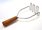 Excellent Antique 1930's Butterscotch Bakelite Handle Steel Wire Potato Masher — photo 1