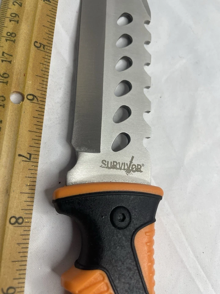 Cuchillo Survivor de acero inoxidable mango naranja hecho en EE. UU. Foto 3 de 4