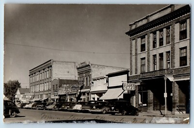 #ad Ellendale North Dakota ND Postcard RPPC Photo Main Street Rays Cafe Clothing Car $25.97