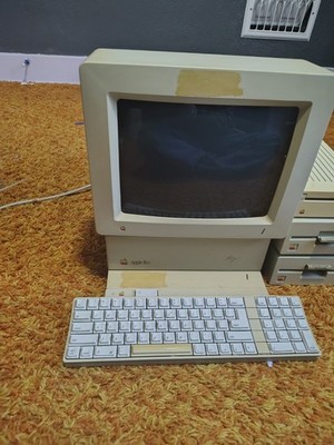 Apple IIGS computer system from 1986 which includes The Floppy Disk And Keyboard