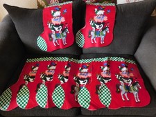 LOT OF EIGHT CHRISTMAS STOCKINGS THAT ARE CUT OUT AND READY TO FINISH