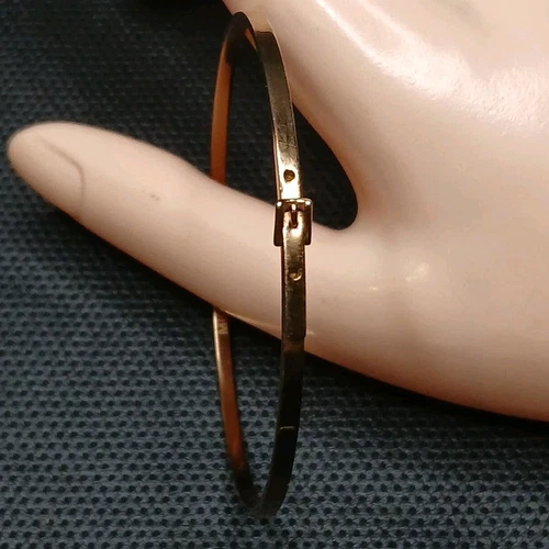 Bracciale MICHAEL KORS con cintura tono oro. 14.124