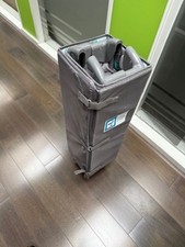 Cuggl travel cot with wheels ready for collection