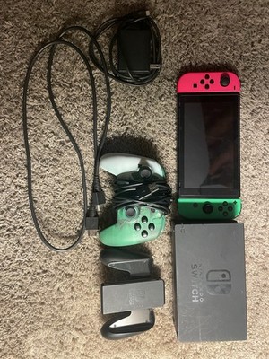 Nintendo Switch, dock, dock and hdmi cables, and controllers