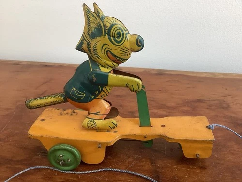 J. Chein tin lithograph Krazy Kat scooter pull toy 1930s