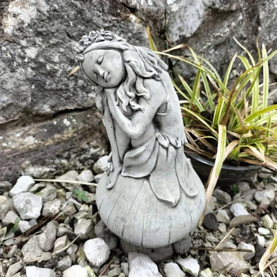 Stone garden ornament fairy sitting on mushroom - Image 1 of 3