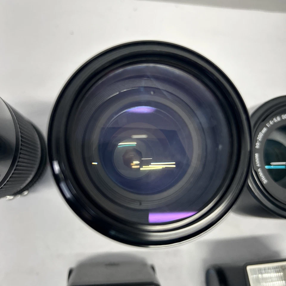 Lote surtido de lentes y accesorios para cámara de 35 mm sin probar. Foto 4 de 4