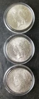 Lot of Three 1923 $1 Peace Silver Dollars in Capsules