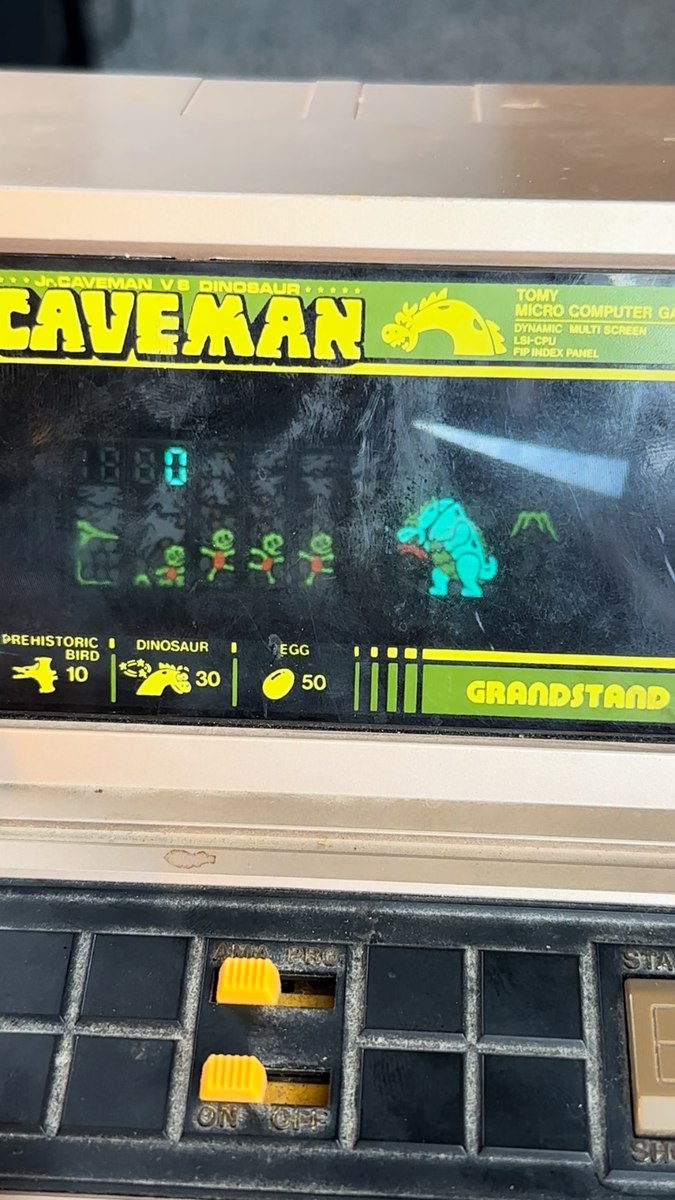 TOMY Caveman Micro Computer Game Handheld Tabletop Arcade Video