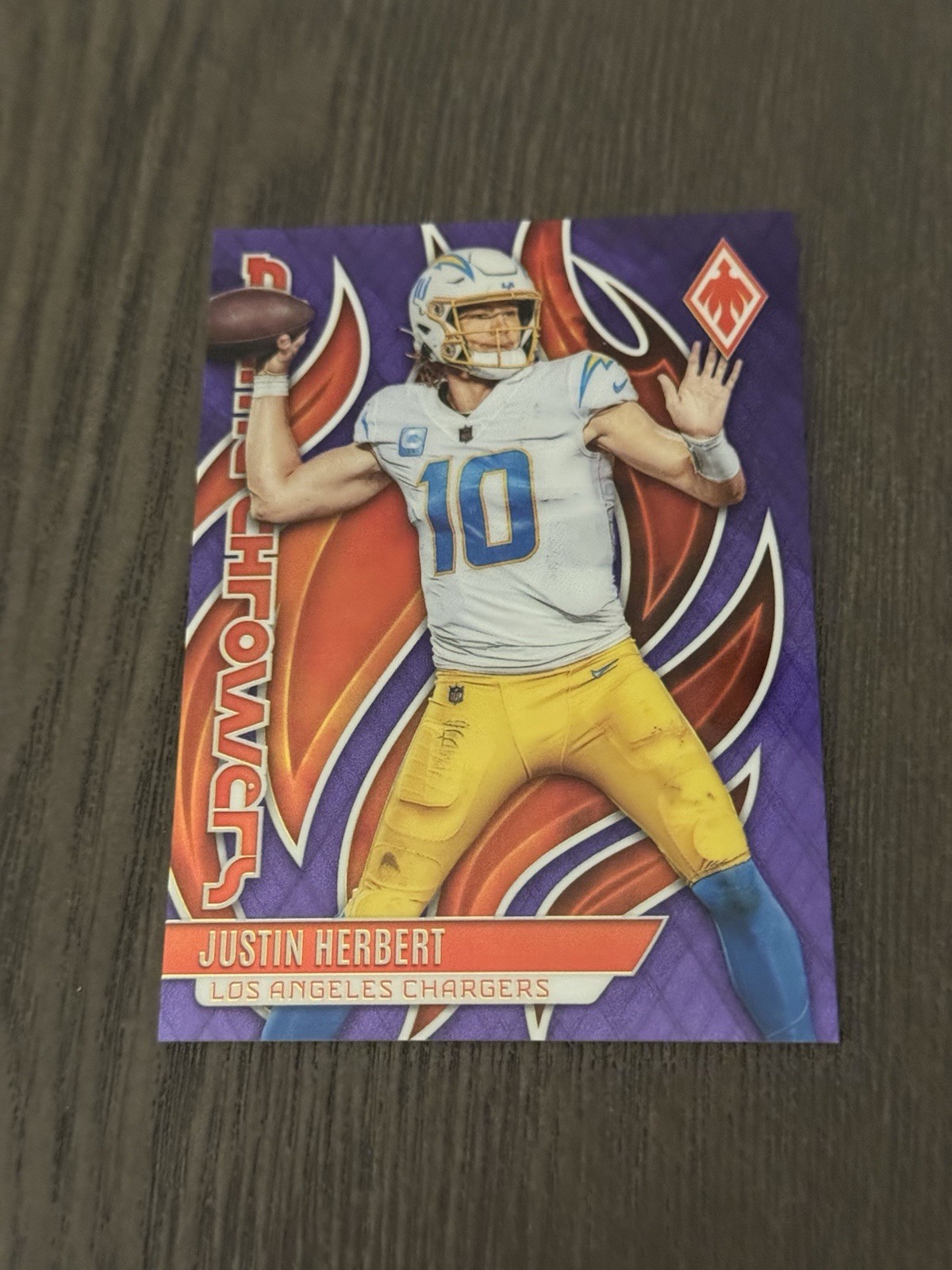 2023 Panini Phoenix Flame Throwers Purple Phoenix /125 #FLA-25 JUSTIN HERBERT