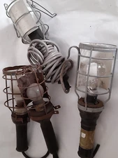 Collection of 4 post war military car inspection lamps