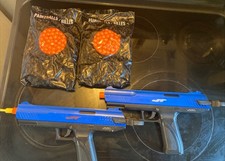 Set Of 2 JT Z100 Paintball Guns W/ 2 Bags Of Orange Paintballs