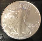 2022 Authenticated Brilliant Uncirculated American Eagle Silver Dollar — photo 2