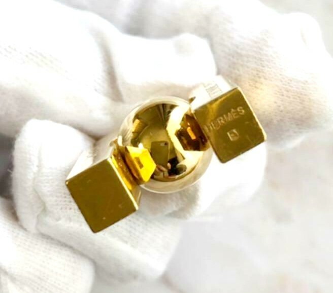 Authentic HERMES Gold Cadena Earth Motif Charm Lock 2001