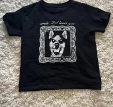 “Smile, God Loves You” Dog Tee – Grunge Horror Graphic Shirt | Y2K Streetwear