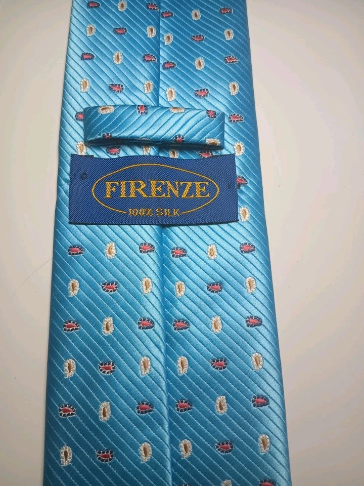 Corbata de seda azul aguamarina Firenze punto cachemir jacquard tejida Italia para hombre lujo Foto 3 de 4