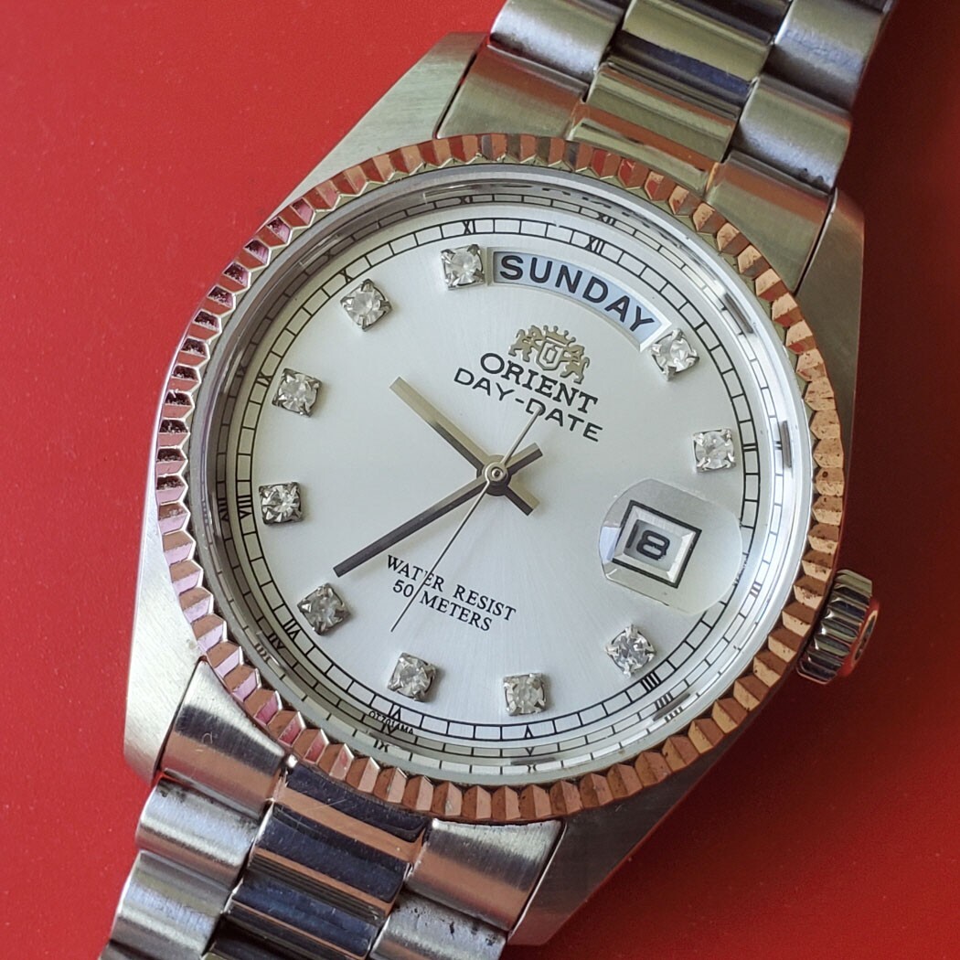 MEN'S ORIENT PRESIDENT 10 POINTS SILVER DIAL QUARTZ DAY DATE SS