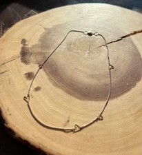 Sundance catalog silver necklace with gold hearts