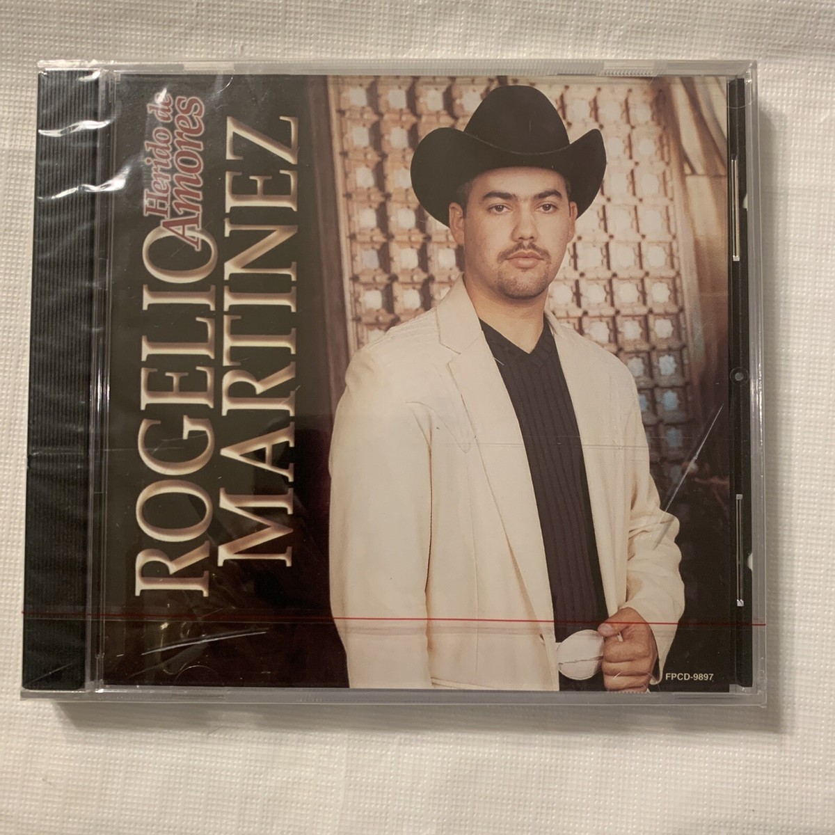 (CD)Herido De Amores／Rogelio Martinez Amazon.com: Herido De Amores: CDs y Vinilo