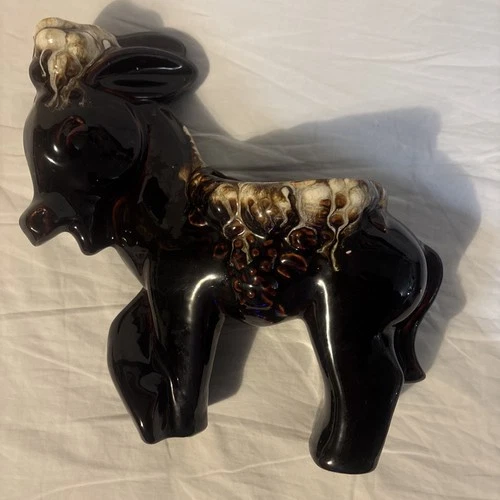 vintage McCoy USA pottery donkey planter with a brown drip glaze