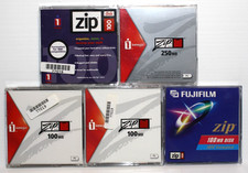 4 Used Iomega 100MB and 1 250 MB Zip Disks - PC Formatted - With Cases