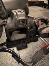 Canon Camera EOS 4000D w/64 GB SD  new Canon bag