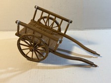 Farmer's Cargo Wagon. Plastic figure with detail as shown. 6" long.