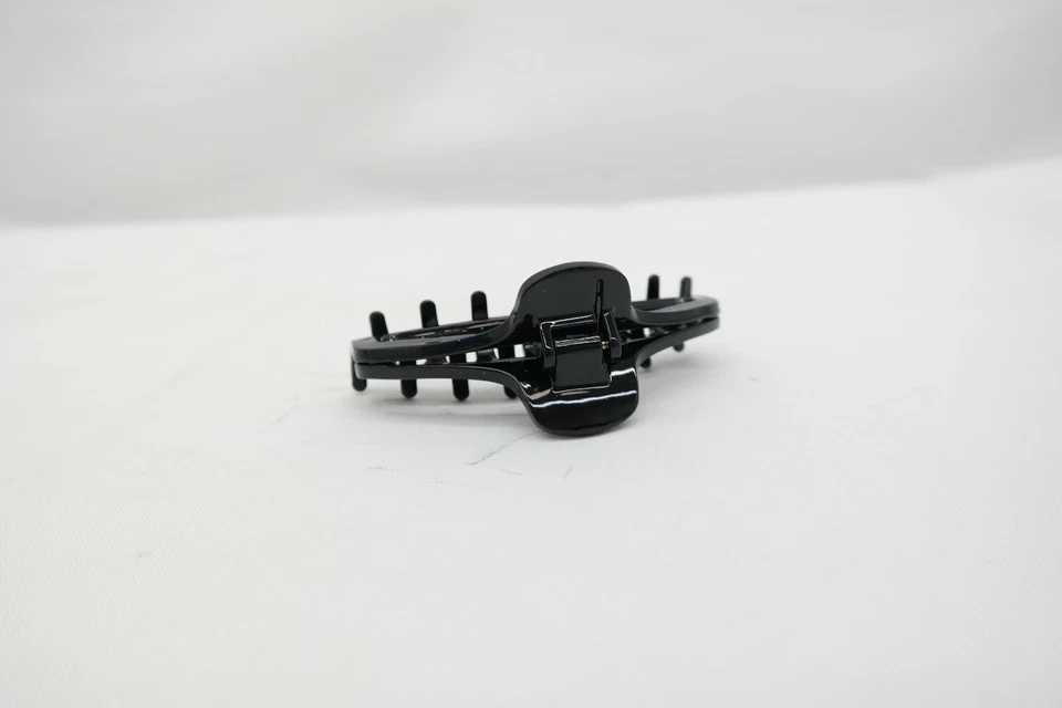 Pinza de pelo abierta negra para caravana TF Foto 4 de 4
