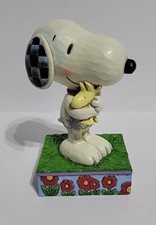 Statuina che abbraccia Peanuts Snoopy e Woodstock 4042377 