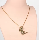 Avon Vintage Gold Tone Angel Pendant Necklace Articulated Foot Star Wand 16 in