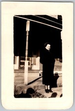 Vtg B&W Snapshot Smiling Woman Dark Winter Coat Porch House Post Shadow 1940s