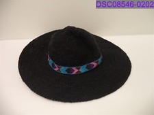 dirty from handling Claire's Black Floppy Aztec Straw Hat P/N 72849
