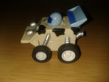 Milk carton shaped pull & go plastic race car. (C40)