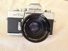 MINOLTA SRT101 CAMERA W/MD ROKKOR 50MM F. I.7 LENS