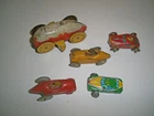 Wyandotte and Marx tin roller coaster cars and Japan tin cars