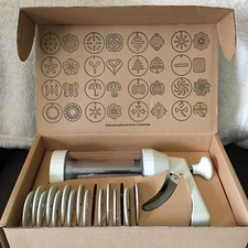 The Pampered Chef 1525 Cookie Press with 14 Discs