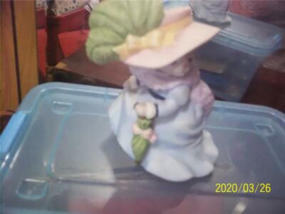 kitty cucumber 1992. b. shackman  kitty statue with parasol and feather  hat
