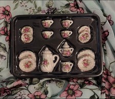 Tiny miniature porcelain tea set