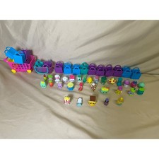 Shopkins Lot with Shopping Cart Basket Bags and 30 Figures Assorted Series