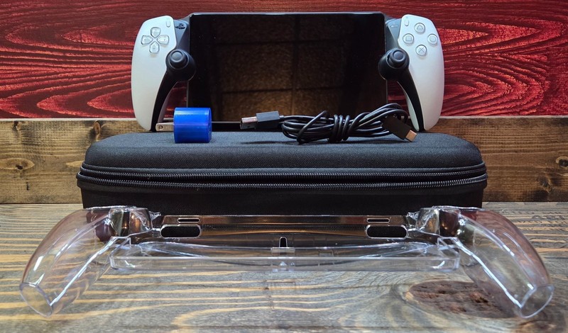 *Sony PlayStation Portable (CFI-Y1001) w/ Travel Bag, Charger, Protective Case*