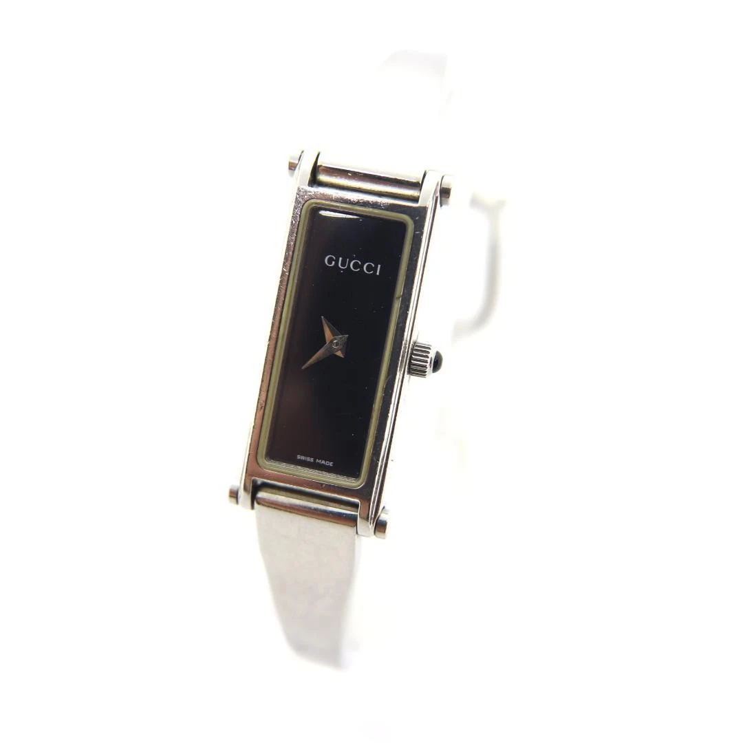 Montre Gucci 1500L noire femme vintage argent rectangle fabrication suisse 12 mm quartz