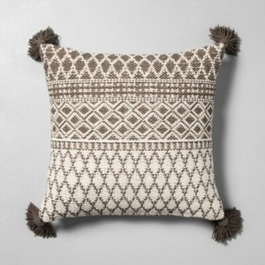 gray tassel pillow