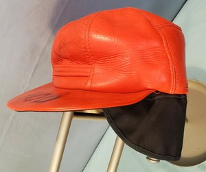 orange hat with ear flaps
