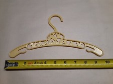 Vintage Baby World Co. plastic hanger