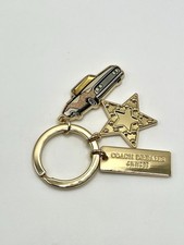 COACH Dreams Sunset Pink Cadillac Gold-tone Star Logo Gold Keychain NWT