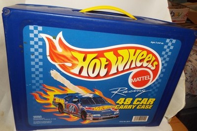 One 48 Vehicle Hot Wheels Carry Case plus 12 Miscellaneous Hot Wheel Vehicles