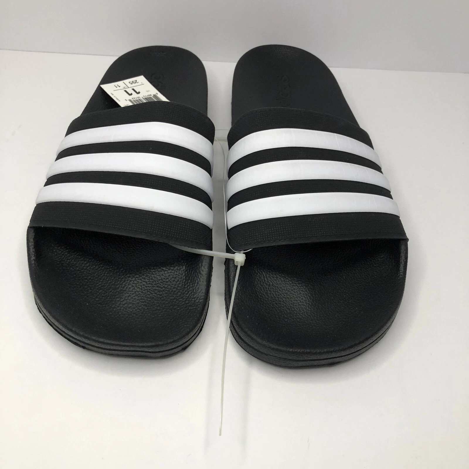 Sandali da uomo Adidas Adilette taglia 11 slide. Bianco e nero. Nuovo Con Etichette