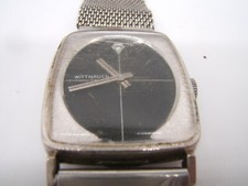WITTNAUER DRESS WATCH BLACK DIAL WITH DIAMOND RUNNING